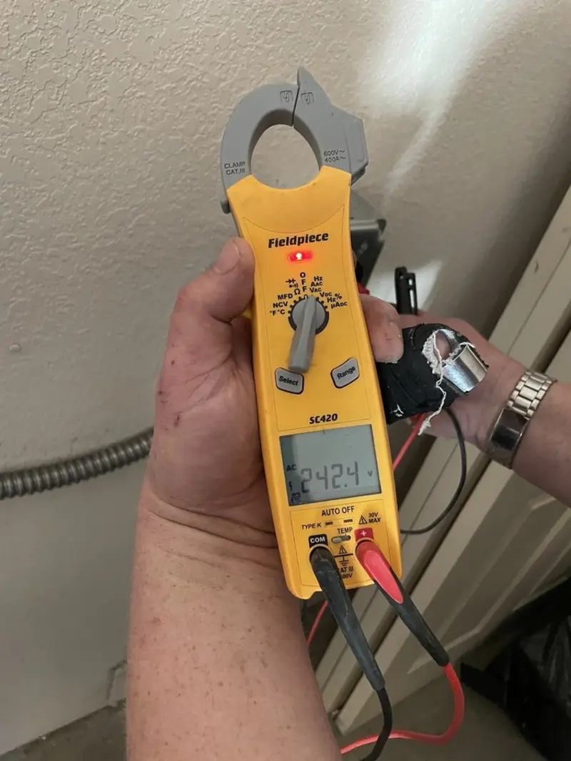 Voltage testing with clamp meter during Hot Tub / Pool Electrical Wiring in Kosciusko